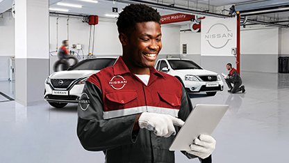 Nissan Technician looking at diagnostics  thumb